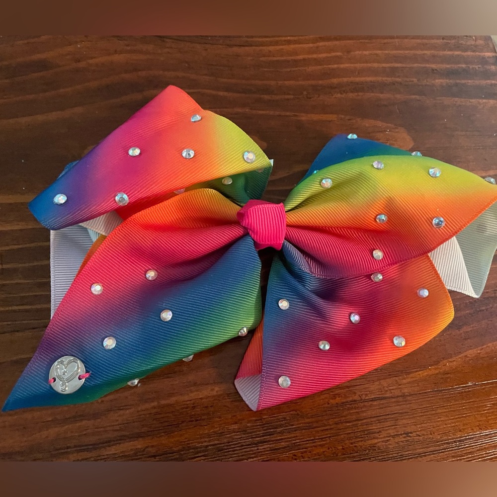 Jojo Siwa signature collection Rainbow Cheer Bow hair clip.